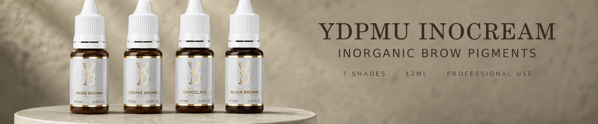 YDPMU INOCREAM inorganic brow pigments in four professional 12ml shades on a mineral sage stone podium